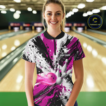 Load image into Gallery viewer, Woman wearing a pink splatter bowling quarter zip jersey during league play front view.