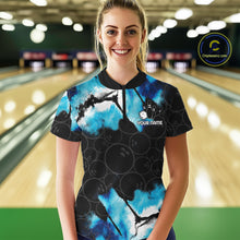 Load image into Gallery viewer, Woman wearing a dreamy blue bowling quarter zip jersey during league competition front view.