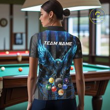 Load image into Gallery viewer, Back view of woman wearing a blue lightning eagle pool shirt inside a billiards hall.