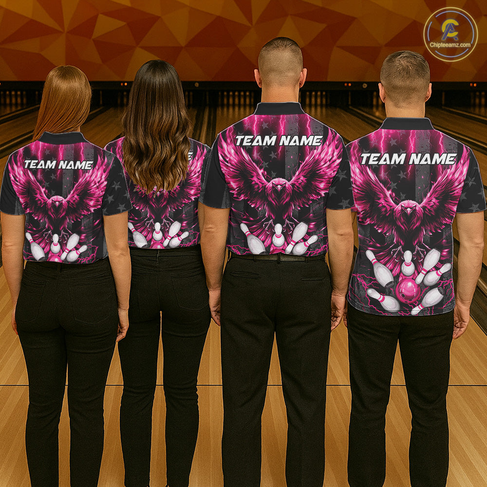 Back view of bowling team wearing matching pink lightning eagle bowling jerseys in a bowling alley.