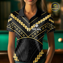 Load image into Gallery viewer, Woman wearing a black and gold 9 ball tribal billiard jersey beside a pool table front view.