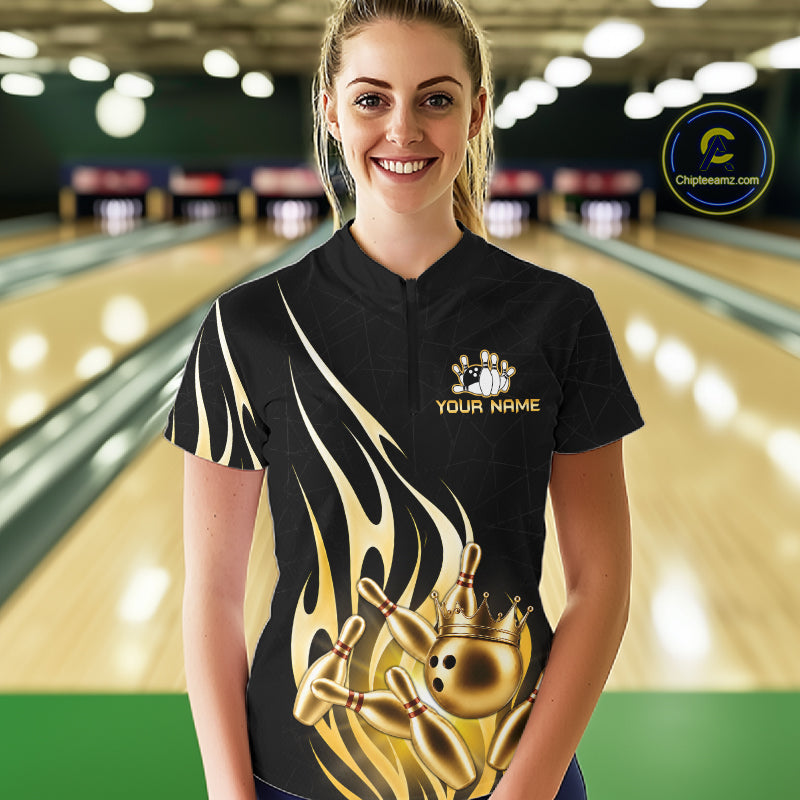Woman wearing a black and gold bowling ball crown quarter zip bowling shirt front view.