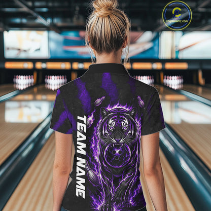 Female bowler wearing Fire Flame Tiger Purple Claws bowling shirt during tournament bowling competition